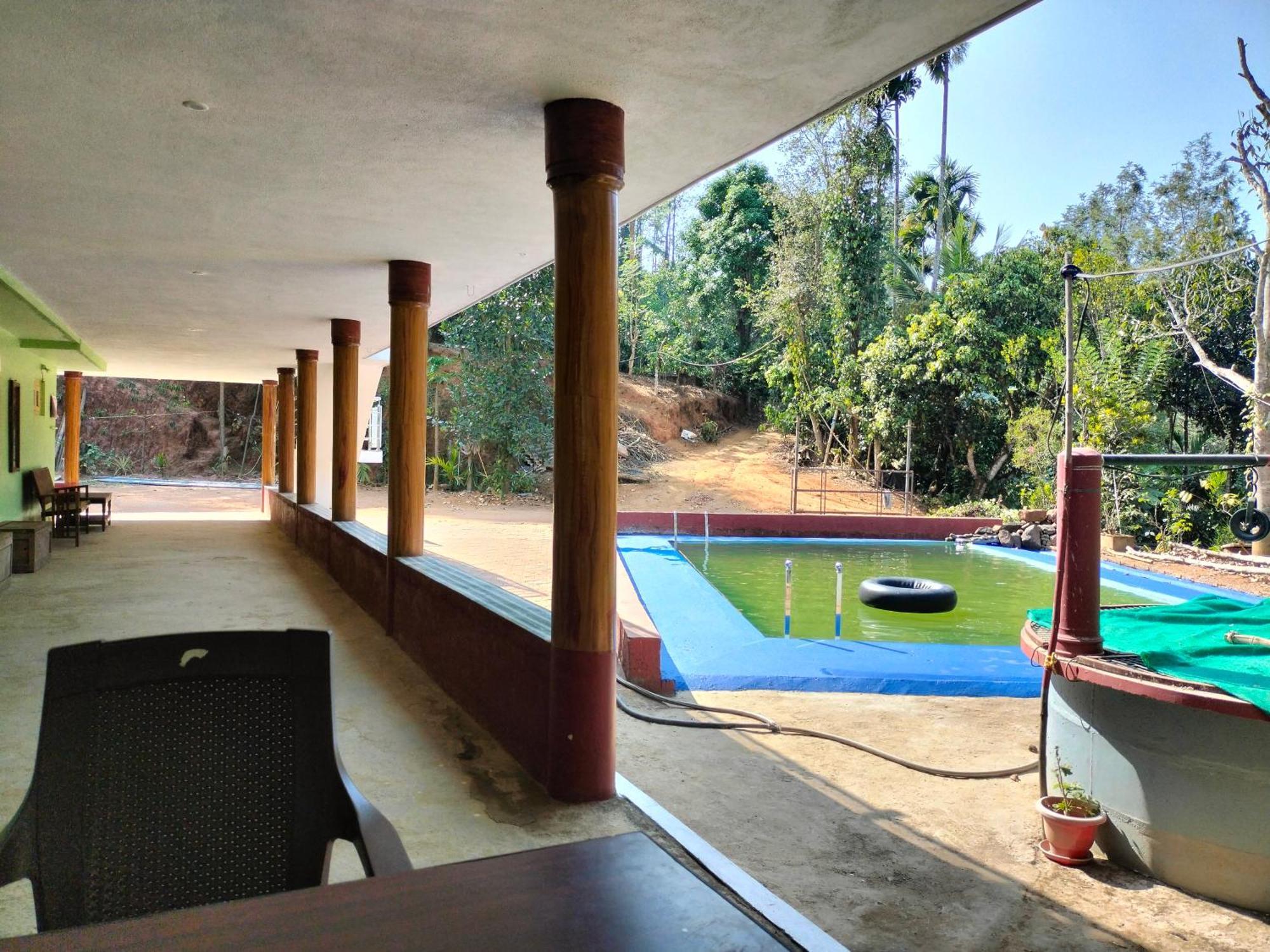 Sambrama Wood House Villa มาดิเครี ภายนอก รูปภาพ
